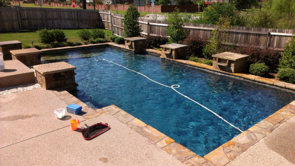 Overview of a pool with fencing