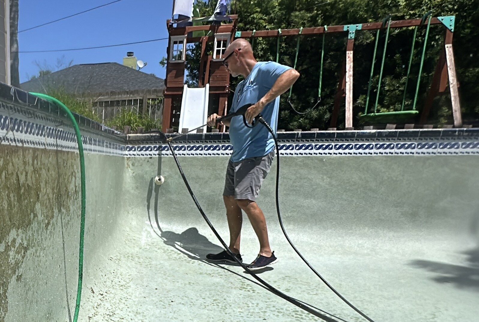 Pressure washing a pool